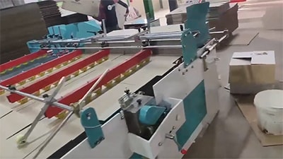 Plegadora encoladora semiautomática -tipo prensado